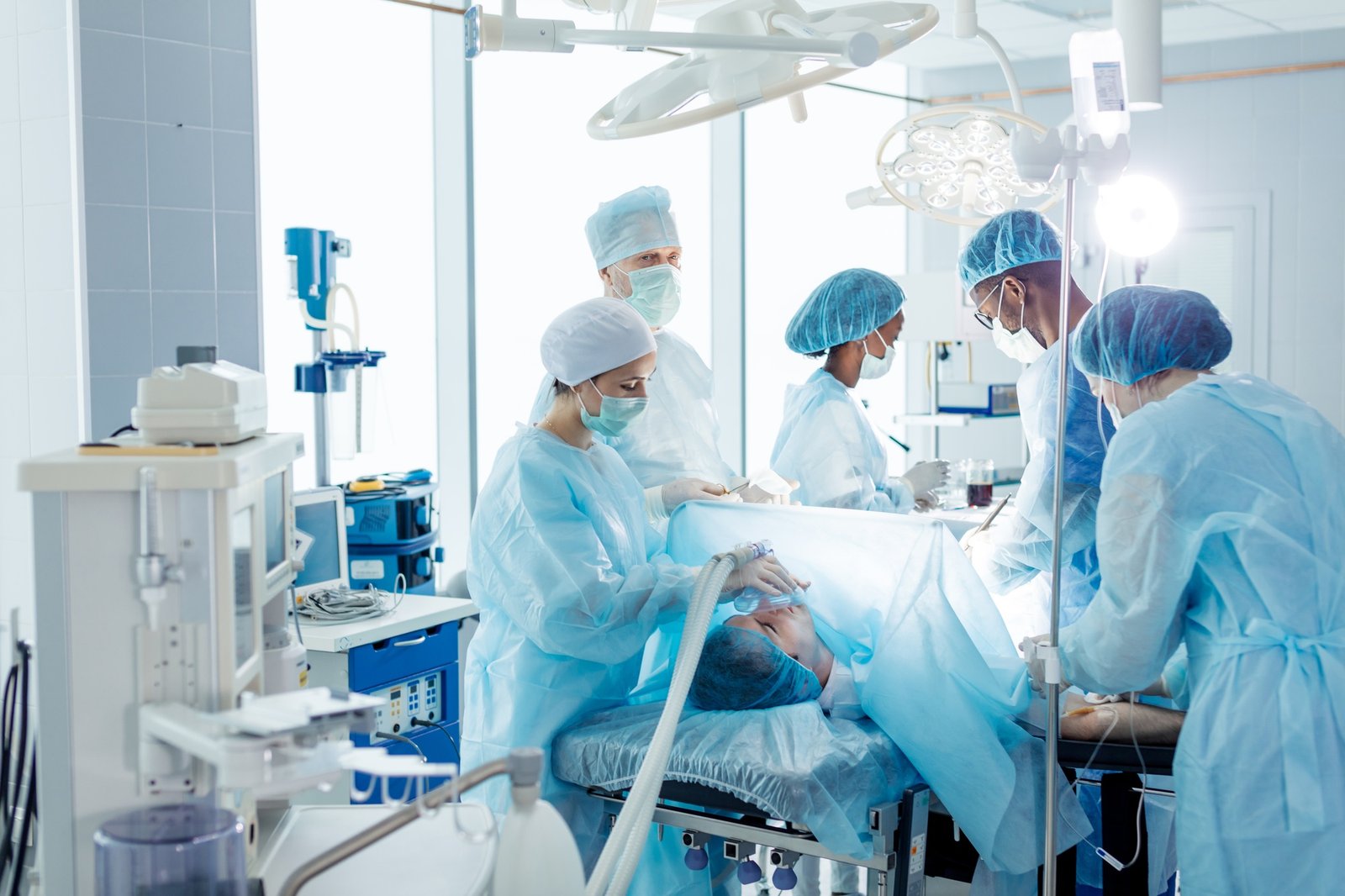 team of doctors repair and diagnose internal problems.